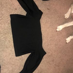 Honey punch black crop top. Very nice arterial. Seams on arms.